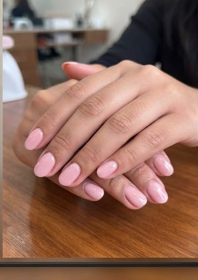 Jiya's milky white short almond nails from The Salon Salvatore